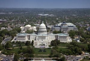 United States Capitol Building, Washington, D.C. Aerial. The United States Capitol is the meeting place of the United States Congress, the legislature of the Federal government of the United States. Located in Washington, D.C., it sits atop Capitol Hill at the eastern end of the National Mall.